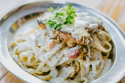 Chicken Alfredo On a Bed of Fettuccini Noodles